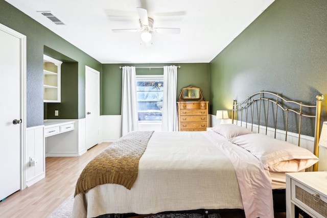 bedroom featuring ceiling fan and light hardwood / wood-style floors