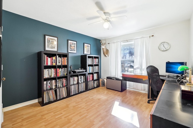 home office featuring ceiling fan and wood-type flooring