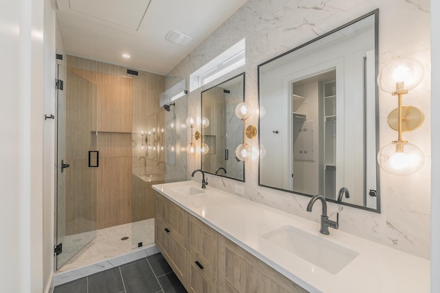 bathroom featuring an enclosed shower, vanity, and tile patterned flooring