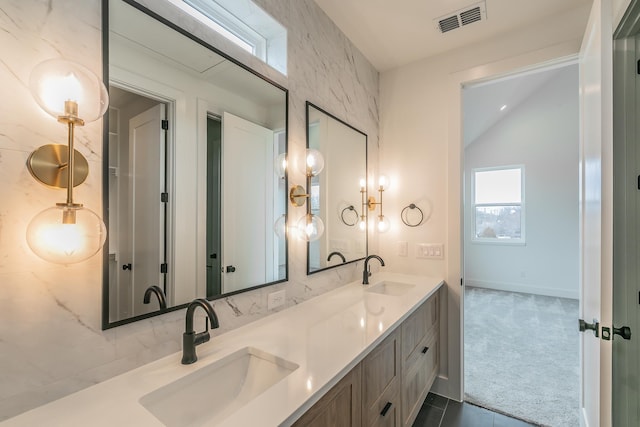 bathroom featuring tile patterned floors and vanity