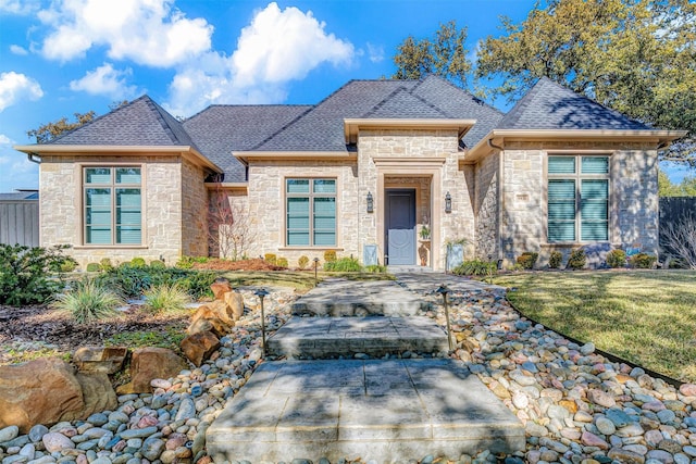 view of front of home with a front lawn