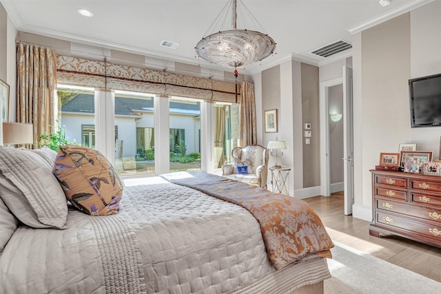 bedroom featuring access to outside, crown molding, a notable chandelier, and light wood-type flooring