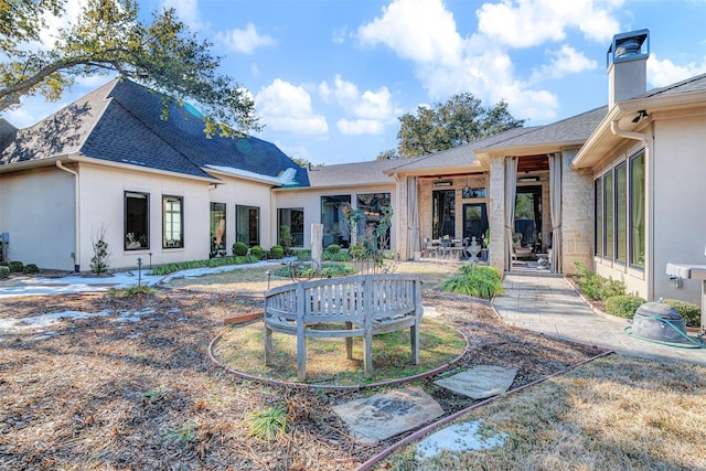 back of house featuring a patio area