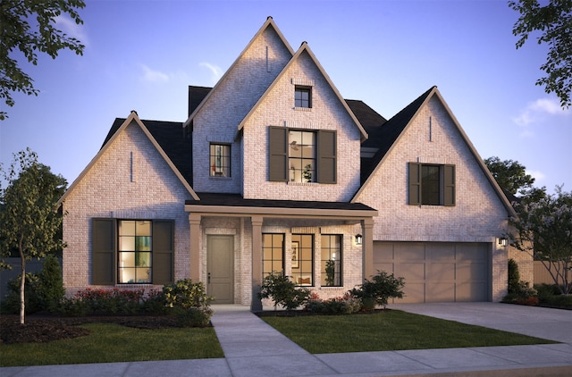 view of front of house featuring a garage and a front yard