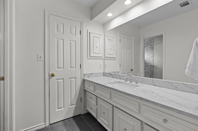 bathroom featuring vanity and tile patterned floors