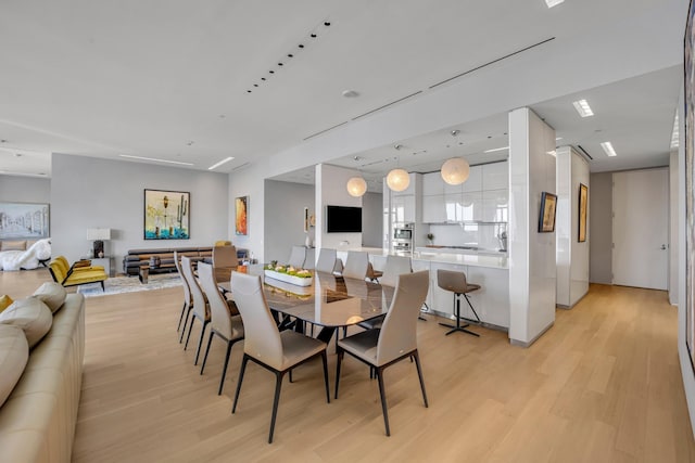 dining room featuring light wood-type flooring