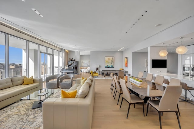 living room with light hardwood / wood-style floors