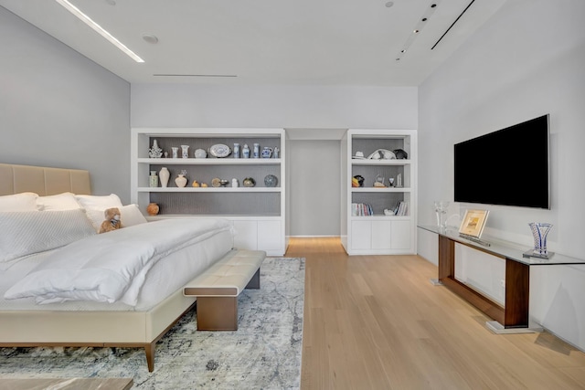 bedroom with light hardwood / wood-style flooring