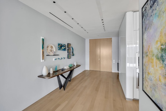 corridor featuring light hardwood / wood-style flooring