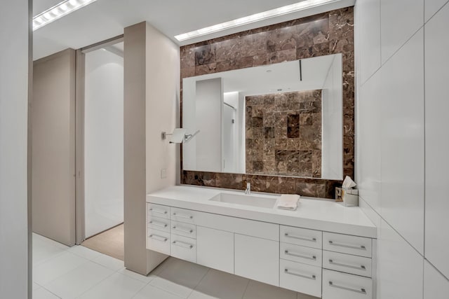 bathroom with vanity and tile patterned flooring