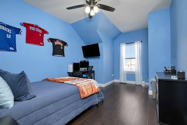 bedroom featuring lofted ceiling, dark hardwood / wood-style floors, and ceiling fan