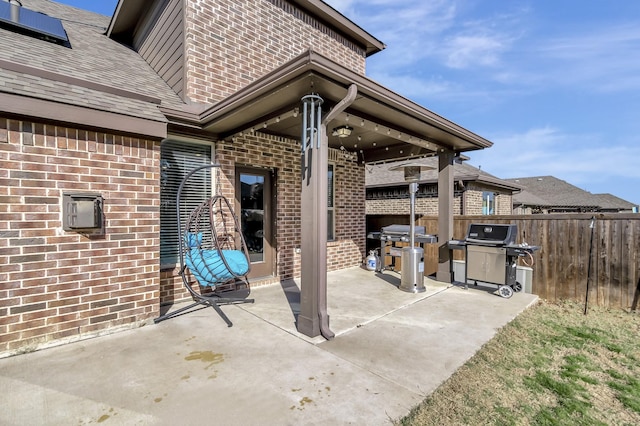 view of patio with a grill