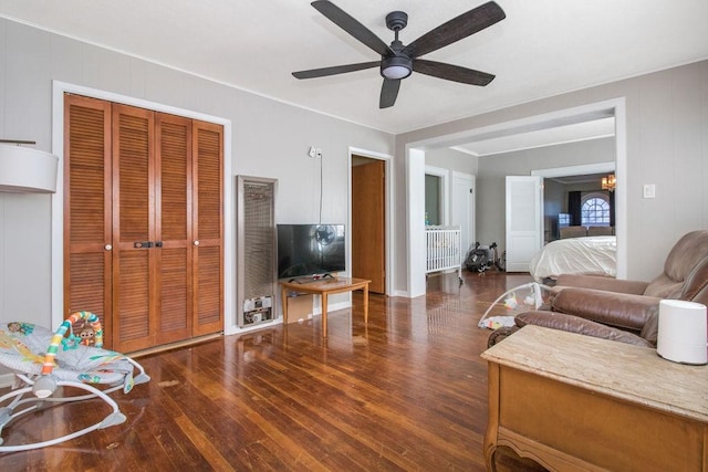 bedroom with ceiling fan and dark hardwood / wood-style floors