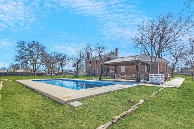 view of pool featuring a lawn and a gazebo