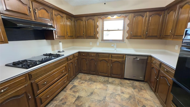 kitchen featuring sink and black appliances