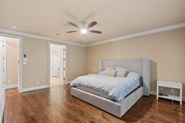 bedroom with crown molding, wood-type flooring, and ceiling fan