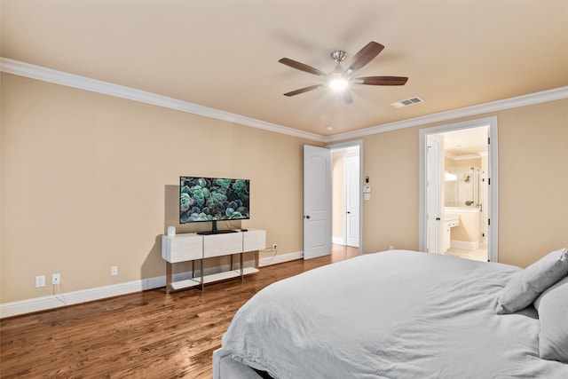 bedroom with hardwood / wood-style floors, ensuite bath, ceiling fan, and ornamental molding