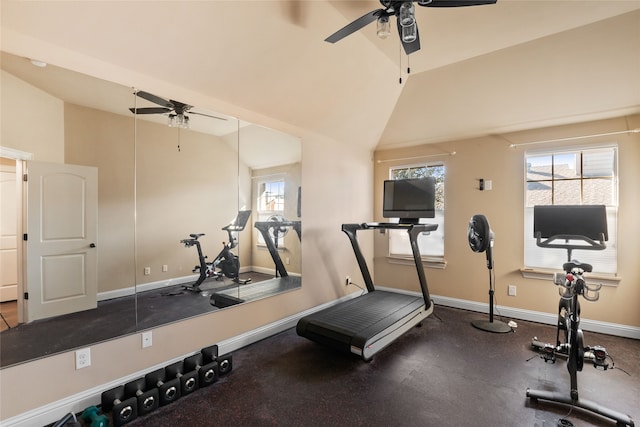 workout room with ceiling fan and vaulted ceiling