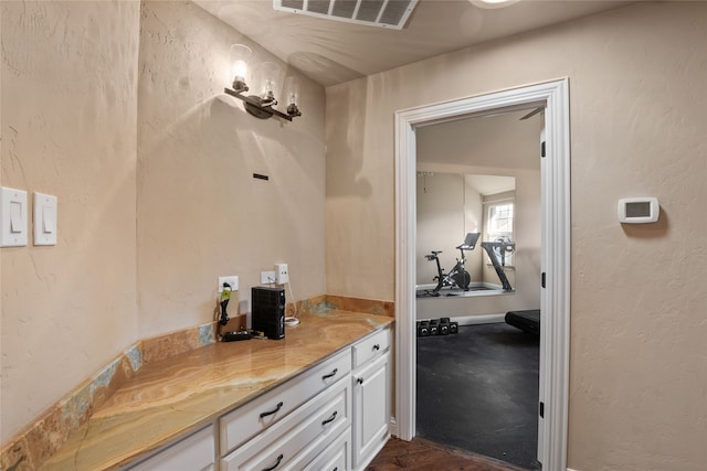 interior space with white cabinetry