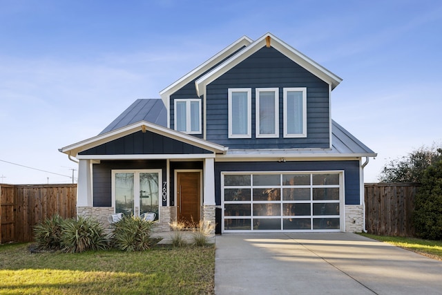 craftsman-style house with a front yard