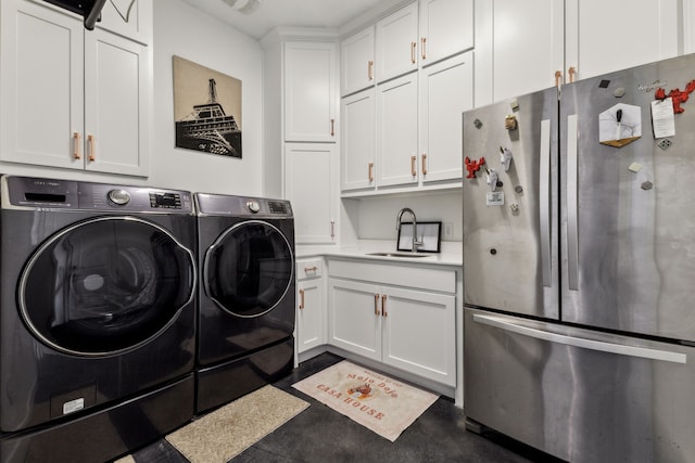 laundry room with sink and washer and dryer