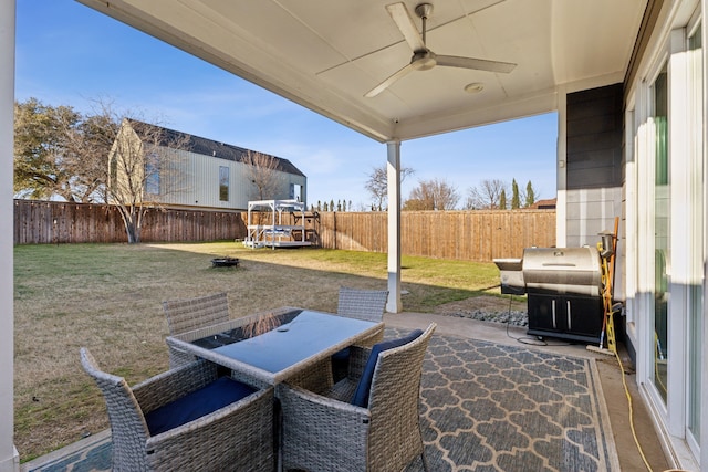 view of patio / terrace with a grill and ceiling fan