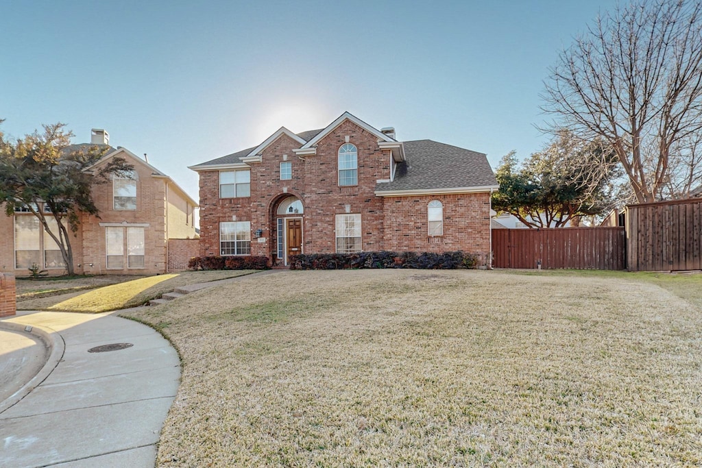 front of property with a front yard