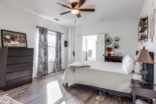 bedroom featuring ceiling fan and wood-type flooring