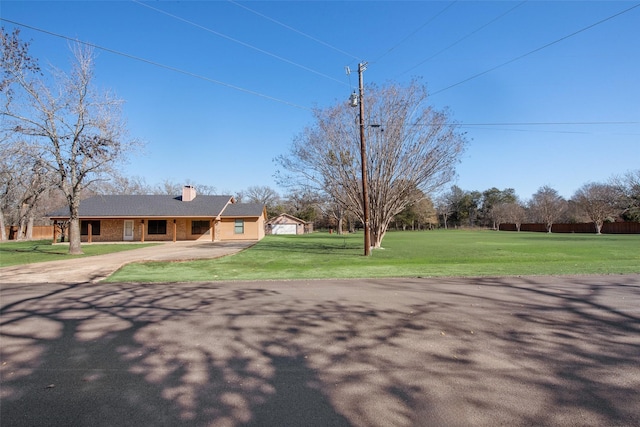 birds eye view of property with a rural view