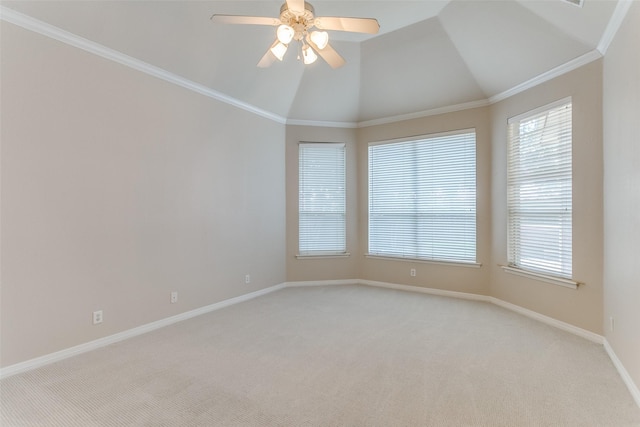 spare room with baseboards, light carpet, crown molding, and vaulted ceiling