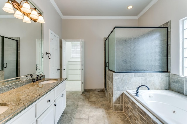 full bathroom featuring a stall shower, a sink, a tub with jets, crown molding, and double vanity