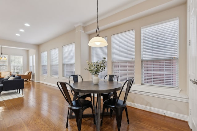 dining space featuring hardwood / wood-style floors