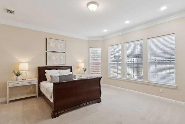 carpeted bedroom featuring ornamental molding