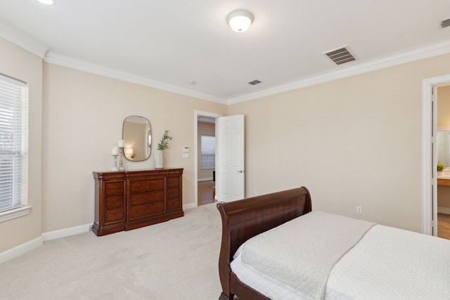 carpeted bedroom featuring crown molding