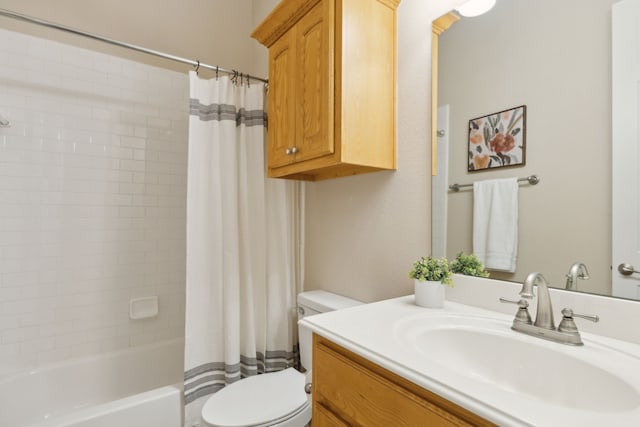 full bathroom featuring vanity, toilet, and shower / bath combo