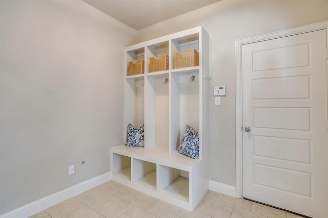 mudroom featuring light tile patterned flooring