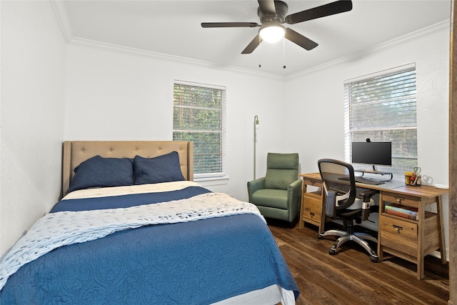 bedroom with ceiling fan, dark hardwood / wood-style floors, and crown molding