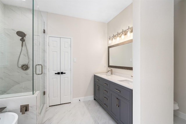 bathroom with vanity and an enclosed shower