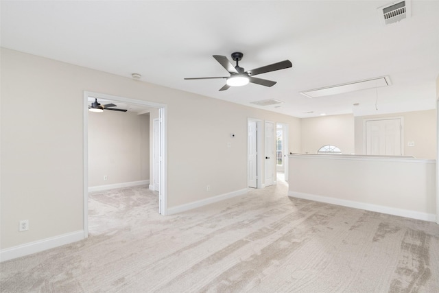 carpeted empty room with ceiling fan