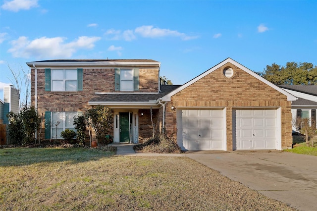 front facade with a front yard and a garage