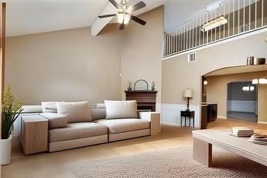 living room featuring beamed ceiling, high vaulted ceiling, and ceiling fan