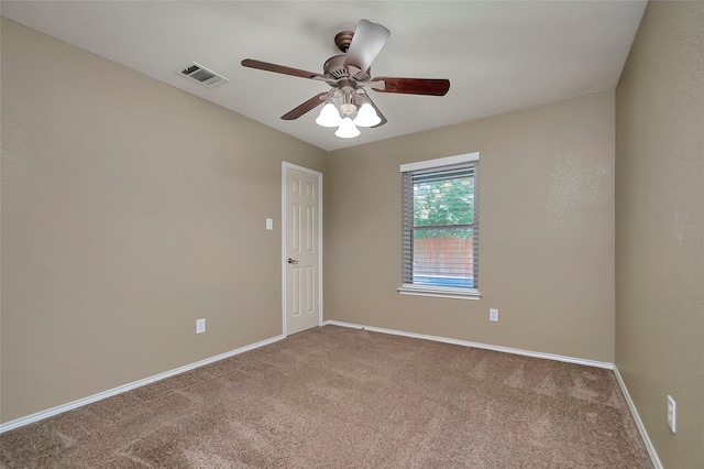 carpeted empty room with ceiling fan