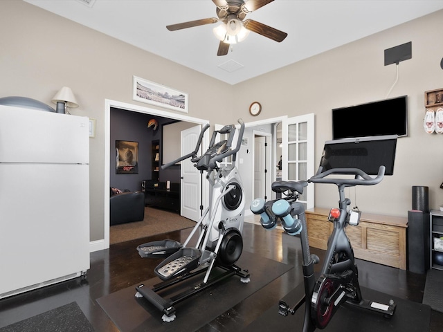 exercise room with french doors and ceiling fan