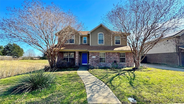 view of front of house with a front lawn