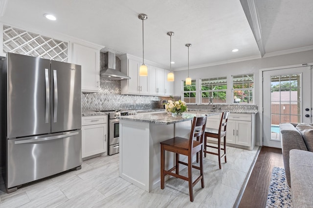 11046 Mccree Rd, Dallas, TX 75238 - kitchen with wall chimney range hood, white cabinets, crown molding, appliances with stainless steel finishes, and a breakfast bar area