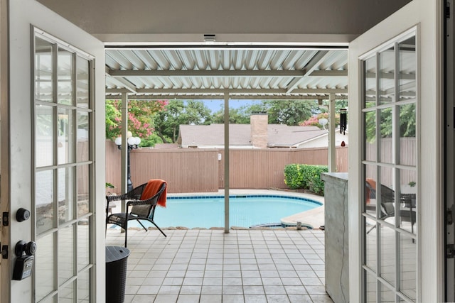 view of pool featuring a patio area, a fenced backyard, and a fenced in pool