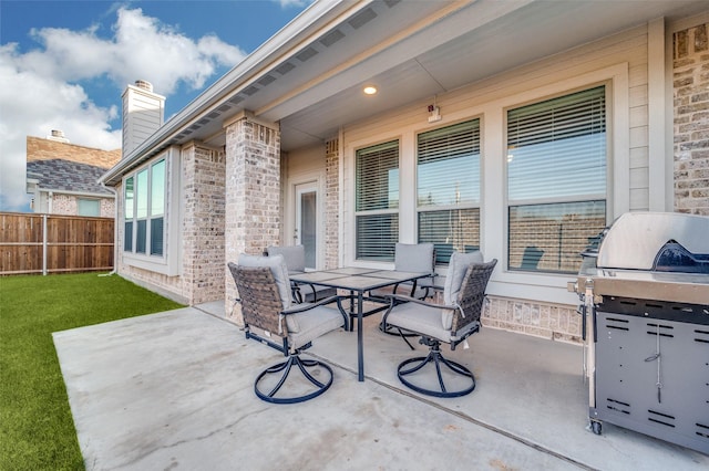 view of patio with a grill