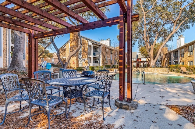 view of patio / terrace featuring outdoor dining space and a pergola