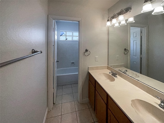 bathroom with vanity and tile patterned floors