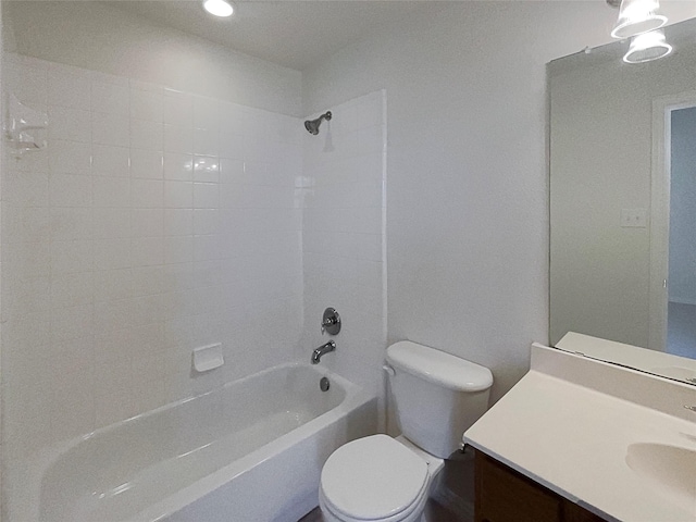 full bathroom with vanity, bathtub / shower combination, and toilet